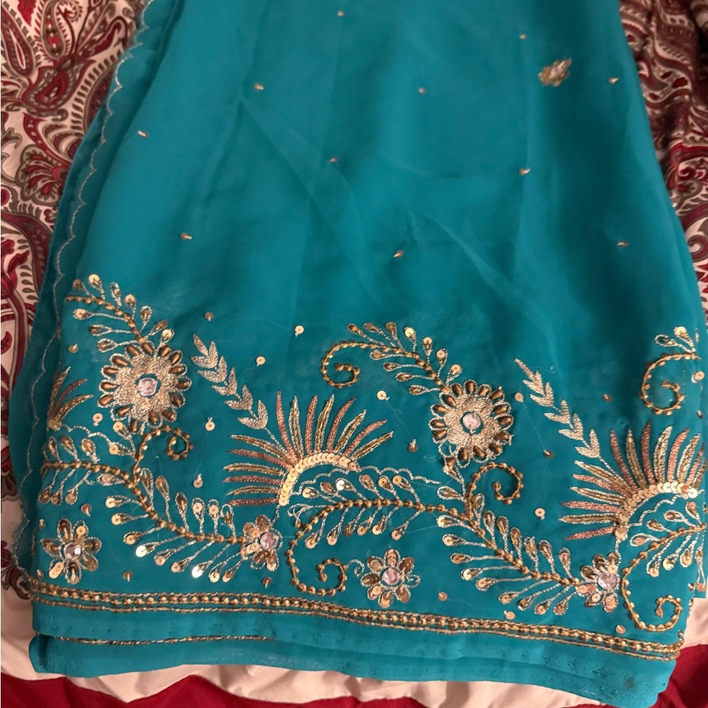 Elegant Teal Embroidered Women's Saree with fall  stitched blouse and petticoat.